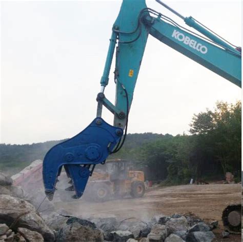 excavator mounted concrete crusher